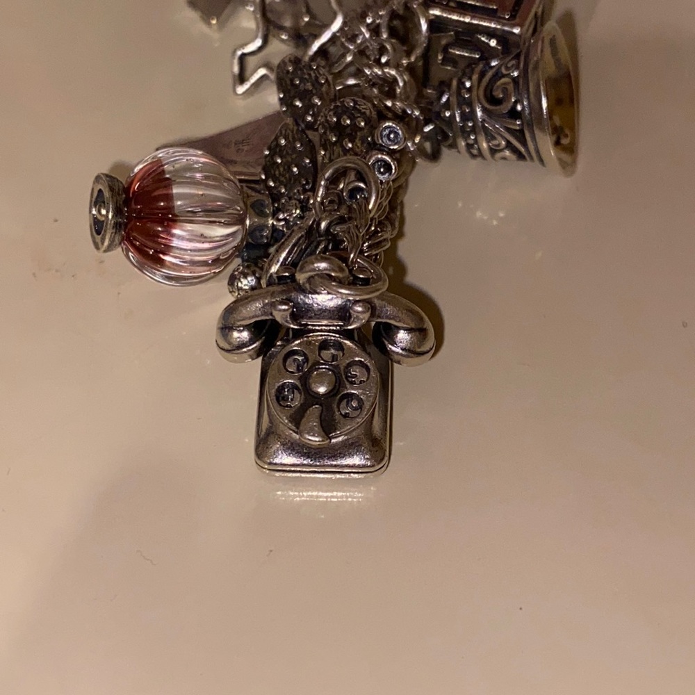 Retired “Hello My Luv” rotary dial phone charm